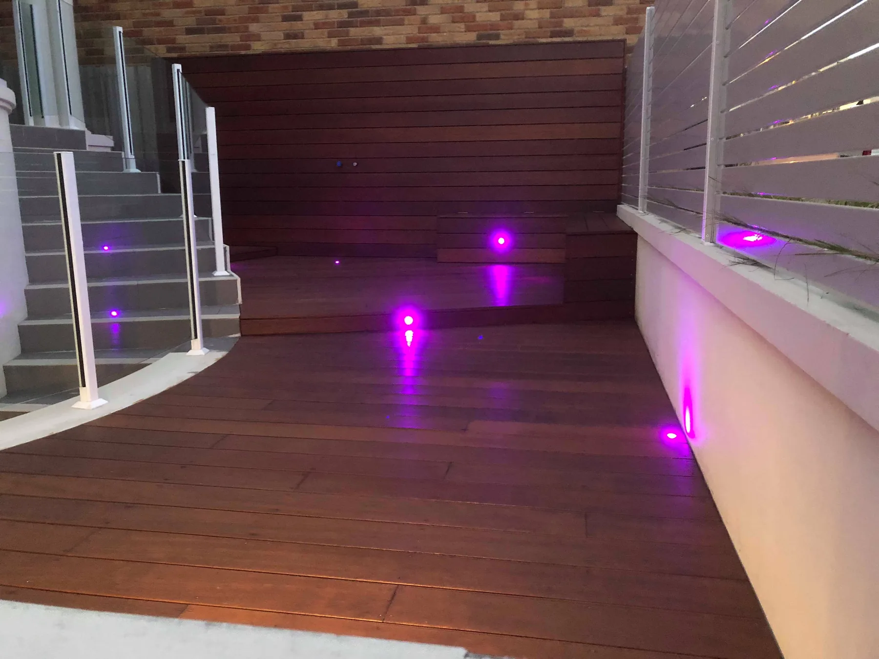 Feature lighting on a residential deck at night